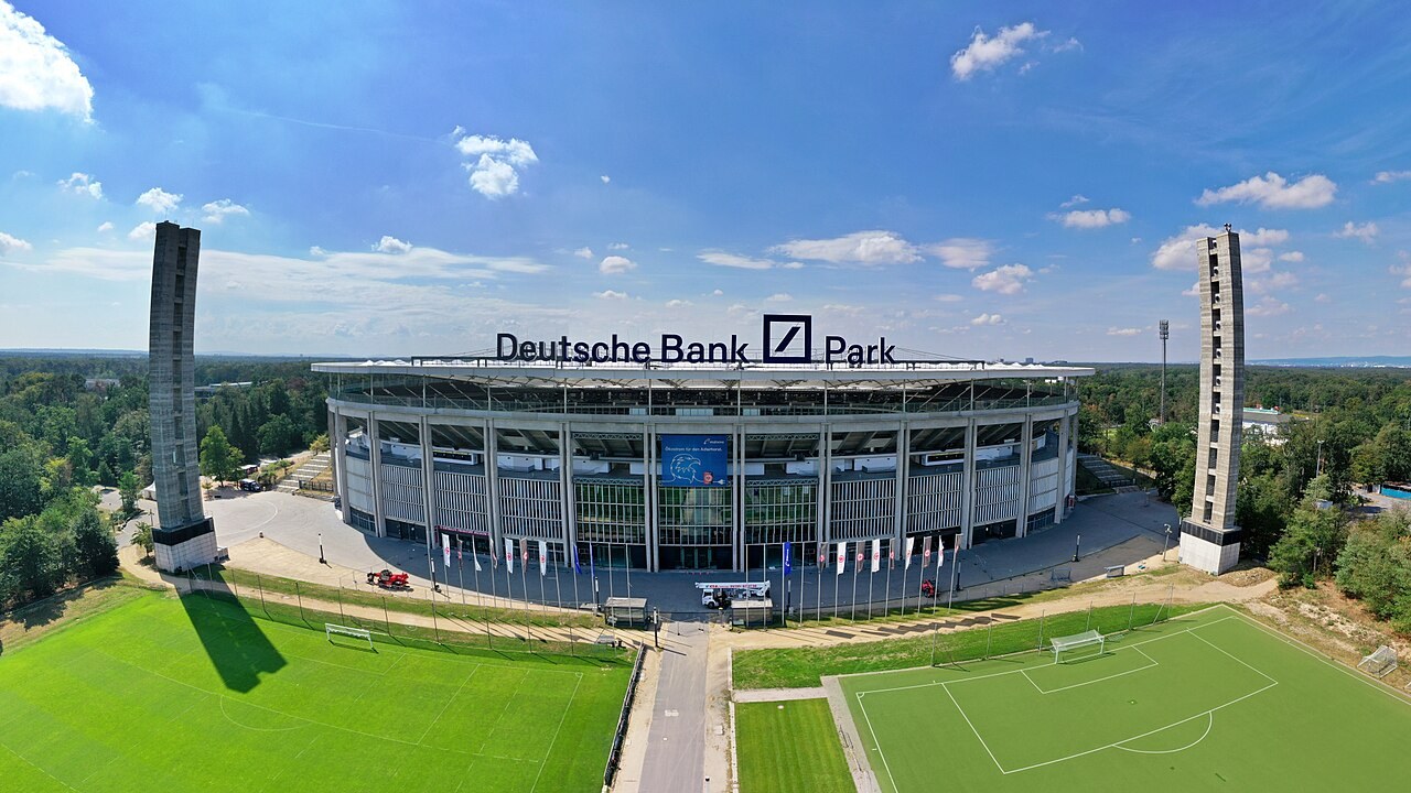 Deutsche Bank Park in Frankfurt, seen from above with the surrounding forest and its two floodlight pylons