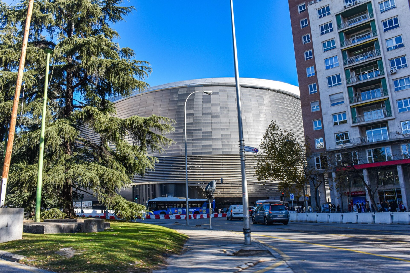 The rebuilt Santiago Bernabéu stadium in Madrid, wrapped in its new metallic facade