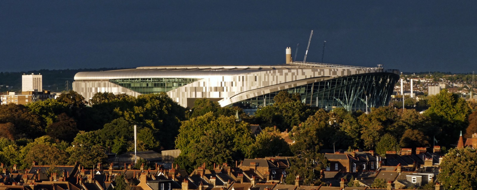 The Tottenham Hotspur Stadium in north London at golden hour